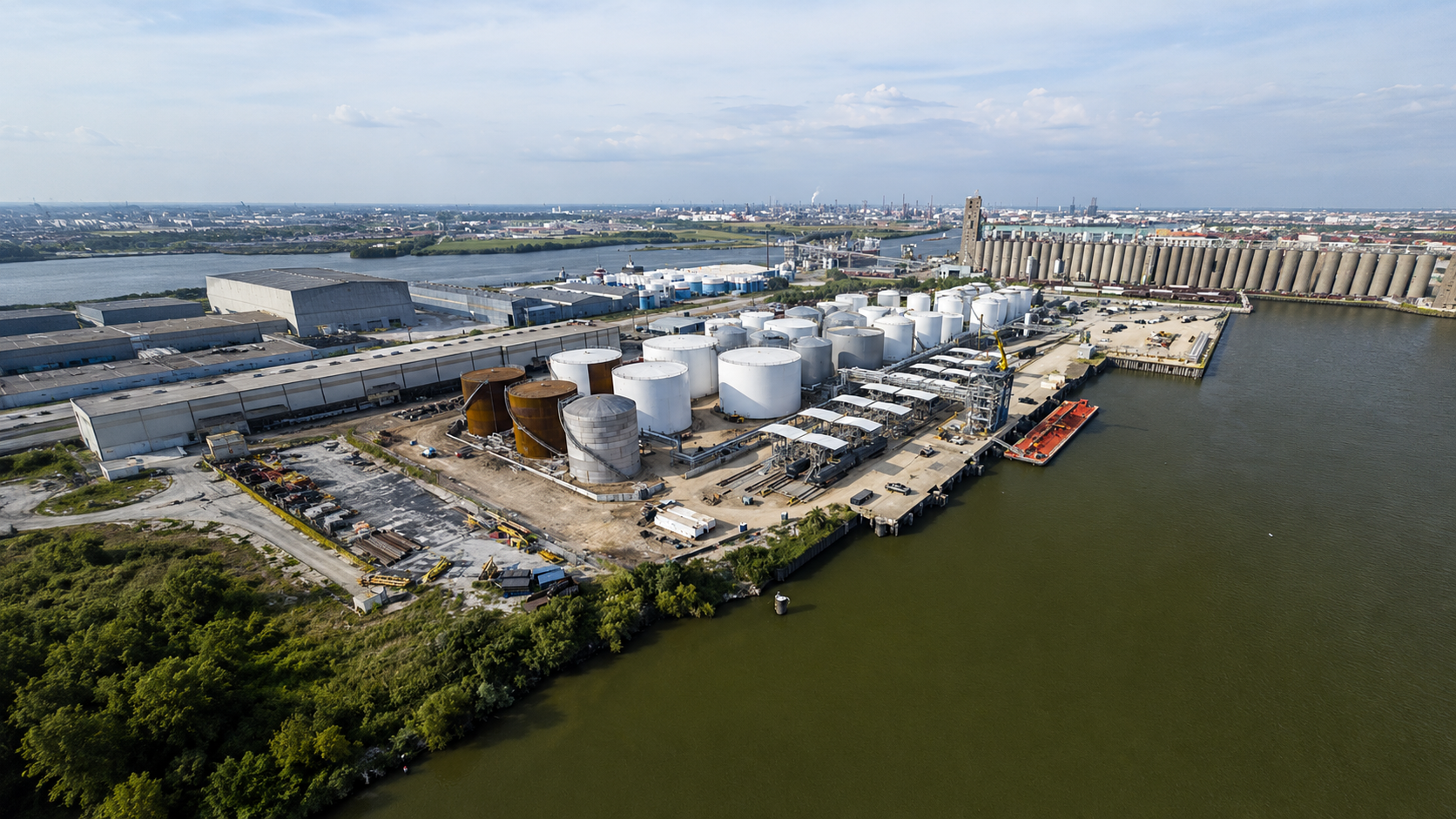 Aerial view of Jacintoport liquid bulk terminal — tank farm, marine docks and tanker berth on the Houston Ship Channel